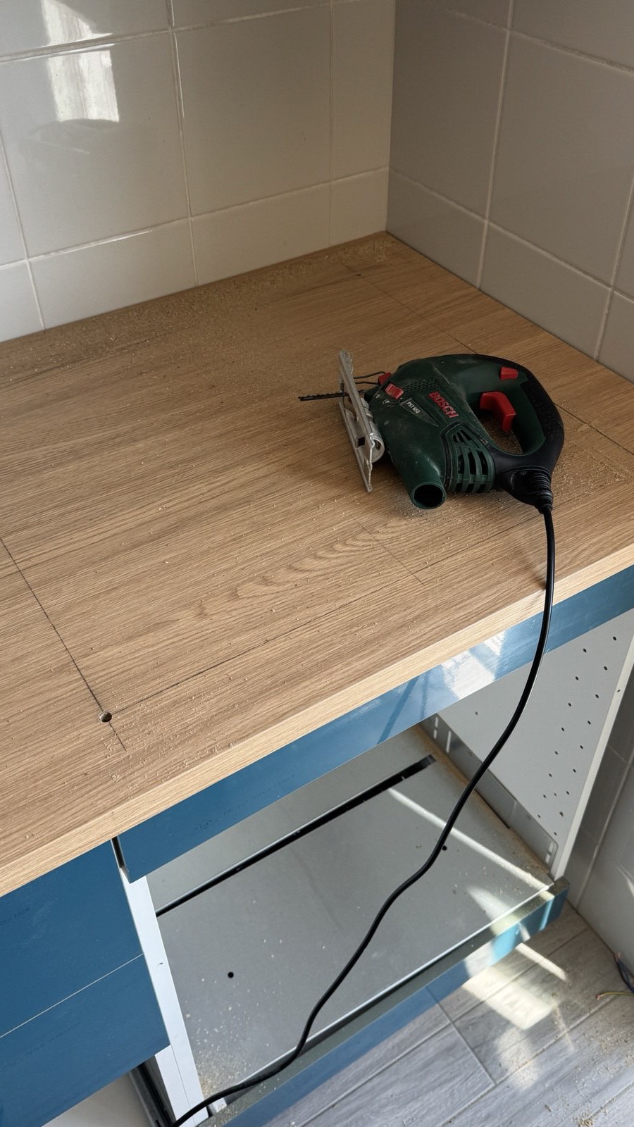 IKEA kitchen worktop being cut during installation